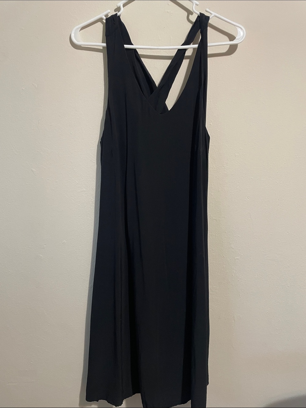 LOFT Black Sleeveless Dress with Cross-Back Straps. Size medium.